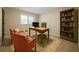 Office/bedroom with desk, chairs, book shelf and light filled window at 2921 Huntcliff Dr, Marietta, GA 30066