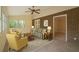 Bright sunroom furnished with comfortable seating and large windows offering views of the outdoors at 2921 Huntcliff Dr, Marietta, GA 30066