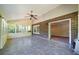 Spacious sunroom with tiled floor, ceiling fan, and ample natural light at 2921 Huntcliff Dr, Marietta, GA 30066