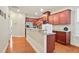 Well-lit kitchen featuring granite countertops and modern appliances at 3229 Hallmark Ln, Buford, GA 30519