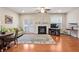 Inviting living room features a fireplace, hardwood floors, and a walk-out to the deck at 3229 Hallmark Ln, Buford, GA 30519