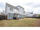 Spacious backyard with patio, lush lawn, and fenced perimeter at 520 Tackett Farms Rd, Smyrna, GA 30082