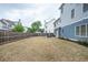 Spacious backyard with privacy fence, patio set, and room for outdoor activities at 520 Tackett Farms Rd, Smyrna, GA 30082