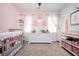 Lovely Bedroom featuring carpeted floors, ample storage, and delicate pink accents at 520 Tackett Farms Rd, Smyrna, GA 30082