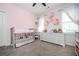 Charming Bedroom with plush carpeting and lovely decor, including pink paper flowers at 520 Tackett Farms Rd, Smyrna, GA 30082