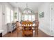 Cozy dining area with wooden table, chairs, and natural light from shuttered windows at 520 Tackett Farms Rd, Smyrna, GA 30082
