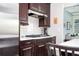 Contemporary kitchen design with stainless steel appliances and white tile backsplash at 520 Tackett Farms Rd, Smyrna, GA 30082