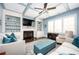 Cozy living room features a fireplace, built-in shelving, a ceiling fan and comfortable seating at 520 Tackett Farms Rd, Smyrna, GA 30082