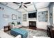 Inviting living room with a fireplace, built-in cabinets, hardwood floors, and cozy furniture at 520 Tackett Farms Rd, Smyrna, GA 30082