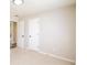 Neutral bedroom featuring carpet, white doors, and ample natural light at 265 Mountainview Dr, Covington, GA 30016