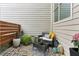 Cozy back patio featuring comfortable seating, a small table, potted plants, and decorative elements for relaxation at 1906 Variations Ne Dr, Atlanta, GA 30329