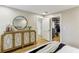 Bedroom boasts natural light, modern console, and convenient closet access at 1906 Variations Ne Dr, Atlanta, GA 30329