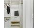 Organized closet provides ample storage with shelves and hanging space at 1906 Variations Ne Dr, Atlanta, GA 30329