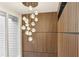 Entryway featuring decorative light fixture and wood paneled walls at 1906 Variations Ne Dr, Atlanta, GA 30329