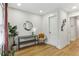 Inviting hallway with hardwood floors, modern decor, and natural light at 1906 Variations Ne Dr, Atlanta, GA 30329