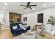 Cozy living room with a modern bar area, beautiful wall decor, and comfortable seating at 1906 Variations Ne Dr, Atlanta, GA 30329