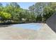 Community tennis court surrounded by mature trees and greenery at 1906 Variations Ne Dr, Atlanta, GA 30329