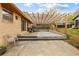 Backyard patio with a wooden pergola, concrete base and brick siding in a home's outdoor space at 338 Patricia Sw Ave, Marietta, GA 30060