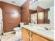 Functional bathroom with a double sink vanity and a bathtub with a shower curtain at 7450 Chads Cir, Jonesboro, GA 30236