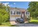 Traditional two-story home with a well-maintained front yard and attached two-car garage at 7450 Chads Cir, Jonesboro, GA 30236