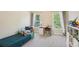 Inviting bedroom filled with natural light and featuring a comfortable bed and a functional workspace at 3065 Arbor Song Ct, Cumming, GA 30041