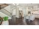 Spacious kitchen area with white cabinetry, stainless steel appliances, and an open layout for entertaining at 3065 Arbor Song Ct, Cumming, GA 30041