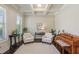 Inviting living room featuring coffered ceilings, hardwood floors, and neutral walls for a calming atmosphere at 3065 Arbor Song Ct, Cumming, GA 30041