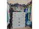 Walk-in closet featuring white chest of drawers and ample hanging space at 5570 Stonewood Ct, Norcross, GA 30093