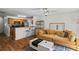 Comfortable living area with an open layout, hardwood floors, and a seamless flow into the kitchen at 5570 Stonewood Ct, Norcross, GA 30093