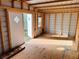 Interior view of a shed featuring exposed framing, wooden floors, and a window at 1277 4Th Ave, Auburn, GA 30011