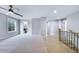 Bright bedroom with a ceiling fan, carpet, and an ensuite bath at 175 Paislee Park (Lot # 11 Paislee Park) Dr, Fayetteville, GA 30215