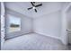 Bedroom showcasing ample natural light from the window and a ceiling fan at 175 Paislee Park (Lot # 11 Paislee Park) Dr, Fayetteville, GA 30215