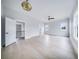 A bright, open-concept room with hardwood floors, neutral walls, and three windows at 175 Paislee Park (Lot # 11 Paislee Park) Dr, Fayetteville, GA 30215
