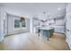 Bright kitchen with white cabinetry, a center island, and pendant lighting, ideal for gatherings at 175 Paislee Park (Lot # 11 Paislee Park) Dr, Fayetteville, GA 30215