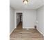 Dining room with wood-look floors, a modern light fixture, and gray walls at 190 Sunrise Cir, Riverdale, GA 30274