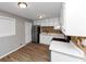 Efficient kitchen with stainless steel appliances, white cabinetry, and modern backsplash at 190 Sunrise Cir, Riverdale, GA 30274