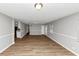 Expansive living room with hardwood floors offering versatile layout options at 190 Sunrise Cir, Riverdale, GA 30274