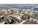 Aerial view of the community, highlighting home's location, landscaping, and neighborhood at 3564 Nathan Farm Ln, Buford, GA 30519