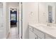 Bathroom with white cabinets and hardware plus a tile floor at 3564 Nathan Farm Ln, Buford, GA 30519