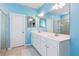 Bright bathroom with a glass shower, double vanity, and modern fixtures at 3564 Nathan Farm Ln, Buford, GA 30519