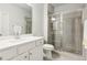 Bright bathroom featuring neutral colors and glass door to separate the shower at 3564 Nathan Farm Ln, Buford, GA 30519
