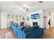 Comfortable living room with a corner fireplace, large windows, and a ceiling fan at 3564 Nathan Farm Ln, Buford, GA 30519