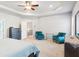 Spacious main bedroom features a tray ceiling, carpet flooring, and ample seating at 3564 Nathan Farm Ln, Buford, GA 30519