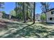 The backyard features a large lot with mature trees at 5567 Stapleton Dr, Dunwoody, GA 30338