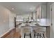 Bright and spacious kitchen features modern cabinets, breakfast bar, and hardwood floors at 5567 Stapleton Dr, Dunwoody, GA 30338
