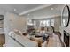 Inviting living room showcasing hardwood floors, fireplace, and abundant natural light at 5567 Stapleton Dr, Dunwoody, GA 30338