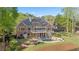 Beautiful backyard featuring a pool, patio, and lush landscaping, perfect for outdoor relaxation and entertaining at 177 Grandmar Chase, Canton, GA 30115