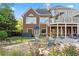 Backyard oasis with a hot tub, fire pit, and seating area, ideal for outdoor gatherings at 177 Grandmar Chase, Canton, GA 30115