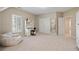 Large bedroom featuring a window with shutters, a beanbag, and a built-in desk at 177 Grandmar Chase, Canton, GA 30115