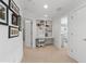 Bright hallway features built-in desk and shelving perfect for a home office or study nook at 177 Grandmar Chase, Canton, GA 30115